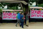 Foto-sekolah-yang-ditutup-karena-para-gurunya-mogok-mengajar.jpg