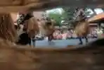 Tari Sari Sarung Setan Kamoro Sambut Meneg LH