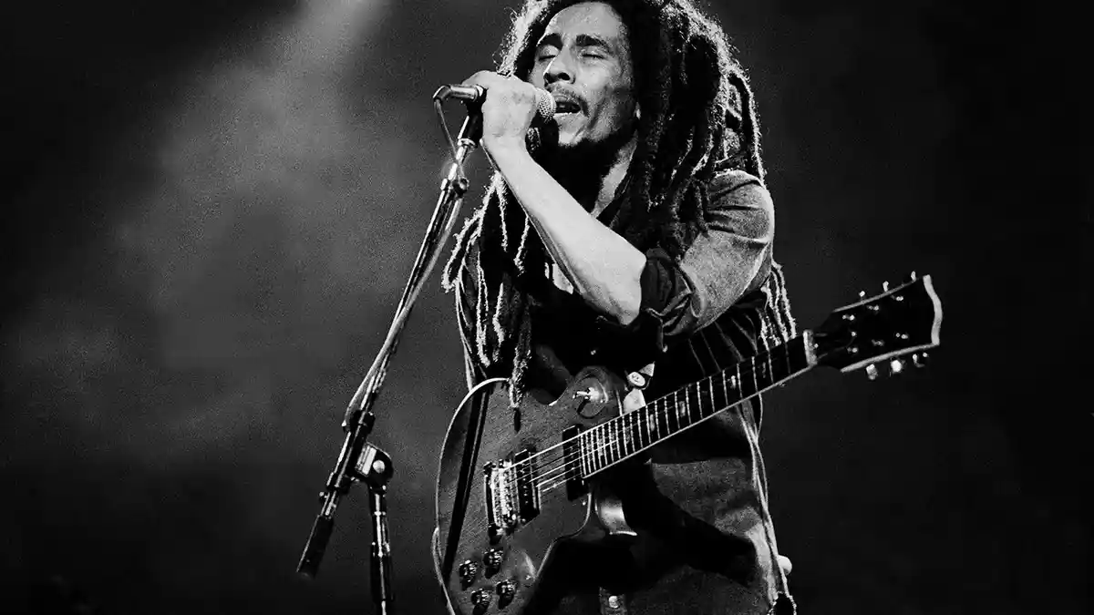 Lirik Lagu dan Terjemahan Johnny Was Bob Marley : The unity must have to start now