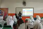 ners-muda-psik-ur-penyuluhan-keremajaan-smp-juara_20180522_125253.jpg