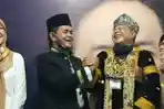 paslon-bupati-solok-nofi-dan-yulfadri.jpg