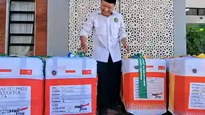 Jemaah-Haji-Kloter-1-YIA-Mulai-Kumpulkan-Koper-Berangkat-Selasa-Malam.jpg