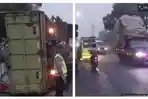 KECELAKAAN-LALU-LINTAS-Dua-unit-truk-angkutan-barang-terguling.jpg