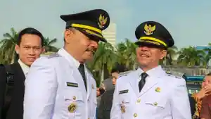Bupati-Ngawi-Ony-Anwar-Harsonobersama-Wakil-Bupati-Dwi-Rianto-Jatmiko-saat-mengikuti-pelantikan.jpg