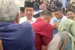 Jokowi-saat-diwawancara-usai-salat-Jumat-di-Masjid-Raya-Al-Mashun-Jumat-29112024.jpg