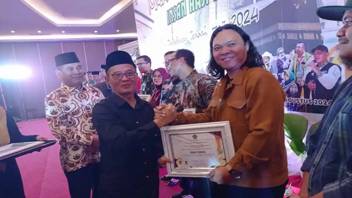 Tribun-Sripo Terima Penghargaan Anugerah Insan Haji 2024 dari Kemenag Sumsel