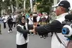 Wali-Kota-Pematangsiantar-Susanti-Dewayani-menerima-api-obor-PON.jpg