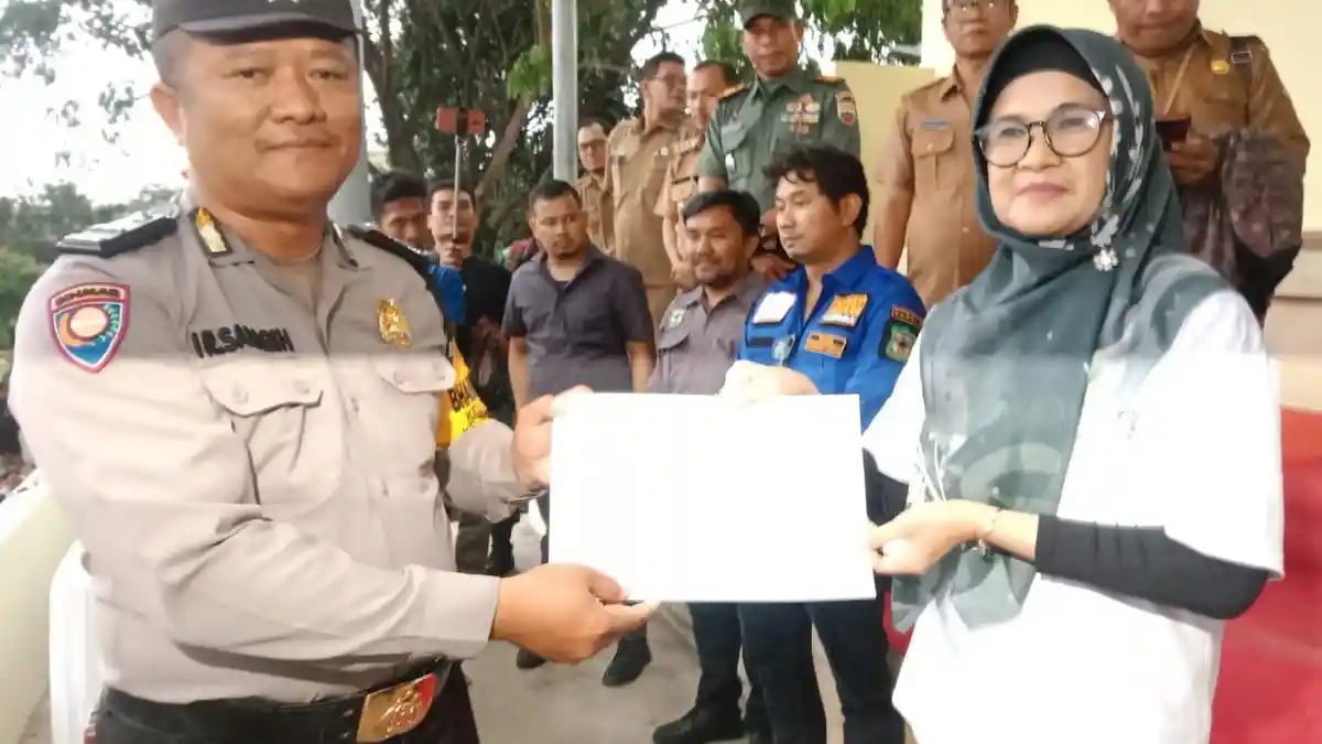 Bhabinkamtibmas Polsek Siantar Marihat Terima Penghargaan Walikota