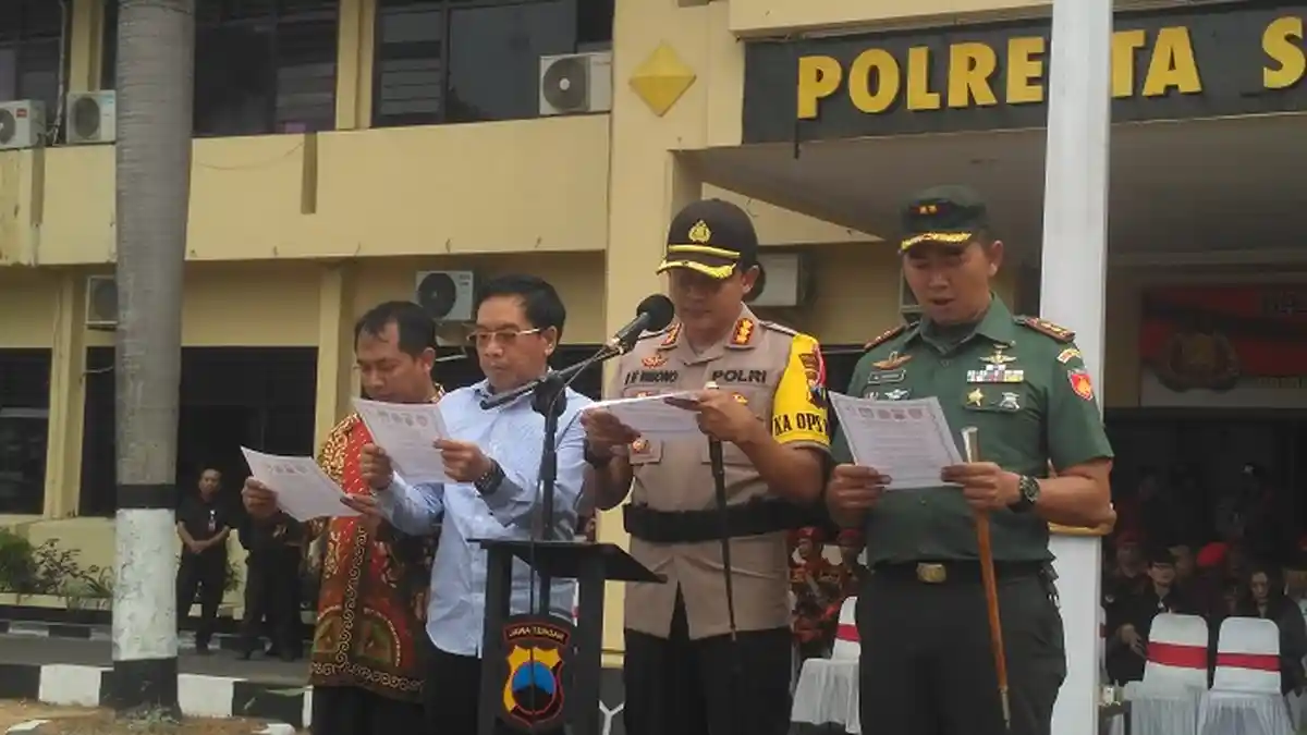 Apel Pengamanan Pemilu, Kapolresta Solo dan Para Pejabat Lain Baca Ikrar Pemilu Bersih dan Netral
