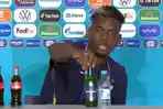 gelandang-prancis-paul-pogba-turunkan-botol-minuman-beralkohol-saat-sesi-jumpa-pers.jpg