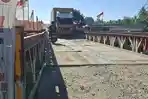 Lantai-jembatan-baili-Kutablang-Bireuen-sempat-ditutup-enam-jam.jpg