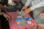 20260603-barang-bukti-obat-daftar-g-yang-akan-diedarkan-di-banyumas.jpg