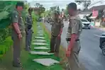 Satpol-PP-Gianyar-saat-akan-membongkar-taman-di-atas-trotoar-77.jpg