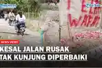 Beredar-di-media-sosial-sebuah-video-yang-menunjukan-ada-kuburan-di-tengah-tengah-jalan-rusak.jpg