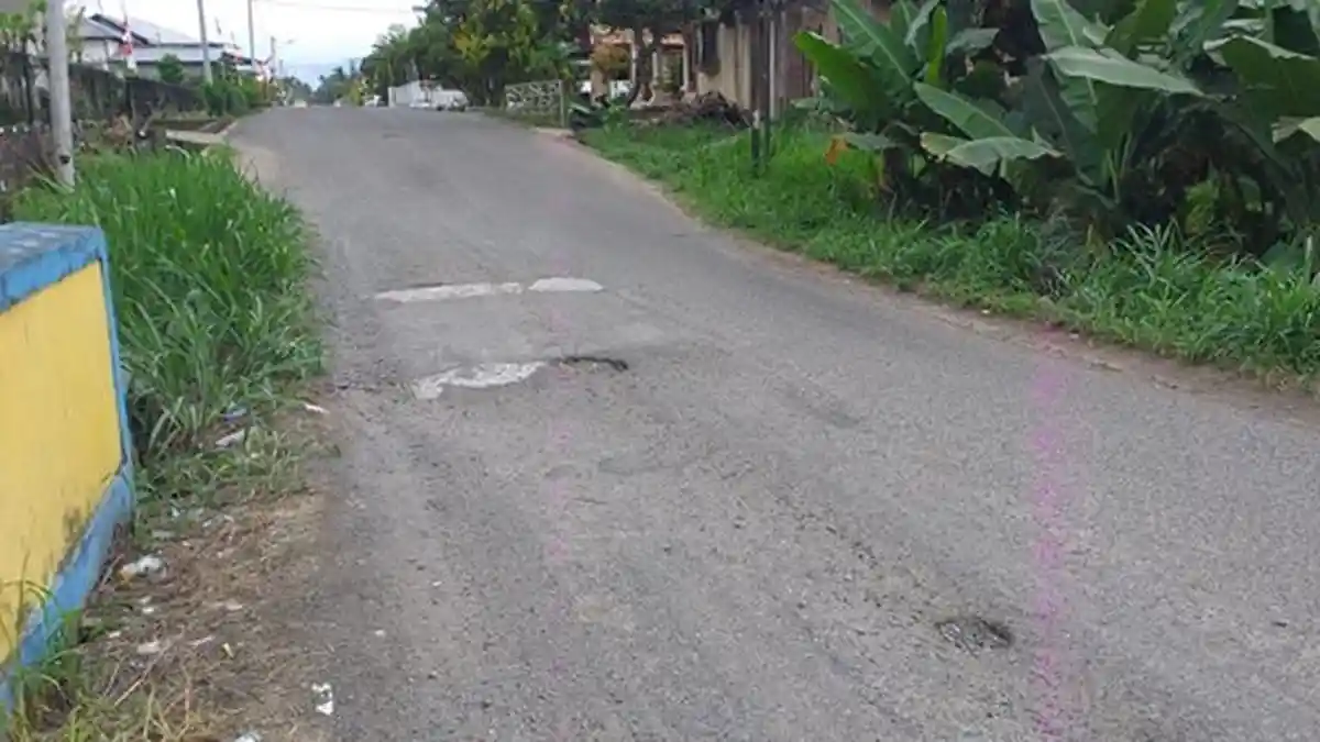 Jalan Rusak di Motoboi Kecil Kotamobagu Membahayakan Pengendara, Pemerintah Diminta Bertindak