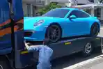 Mobil-Porsche-Doni-Salmanan-disita-polisi-Simpan.jpg
