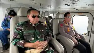 kapolri-dan-panglima-TNI-patroli-udara-menggunakan-helikopter.jpg