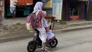 Ilustrasi-Anak-sekolah-mengendarai-sepeda-listrik.jpg