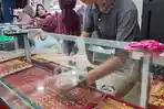 harga-emas-di-OKI-kini-turun-jadi-Rp-14-juta-per-suku.jpg