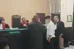 Oknum-polisi-Konawe-Utara-Bripda-I-sidang-di-Pengadilan-Negeri-Kendari-kasus-polisi-aniaya-pacar.jpg