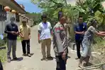 Warga-buka-blokade-akses-jalan-menuju-SMKN-Paku-di-Dusun-Silopo-Desa-Paku-Polman.jpg