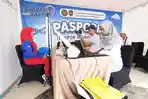Imigrasi-Kendari-Hadirkan-Layanan-PASPORIA-di-CFD-Eks-MTQ-Pemohon-Bayi-Dewasa-Antre-Urus-Paspor.jpg