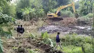 Cari-Sumber-Gas-Metan-BPPTKG-Kerahkan-Alat-Berat-Keruk-Rumpun-Bambu-di-Sungai-Nepen-Seyegan.jpg