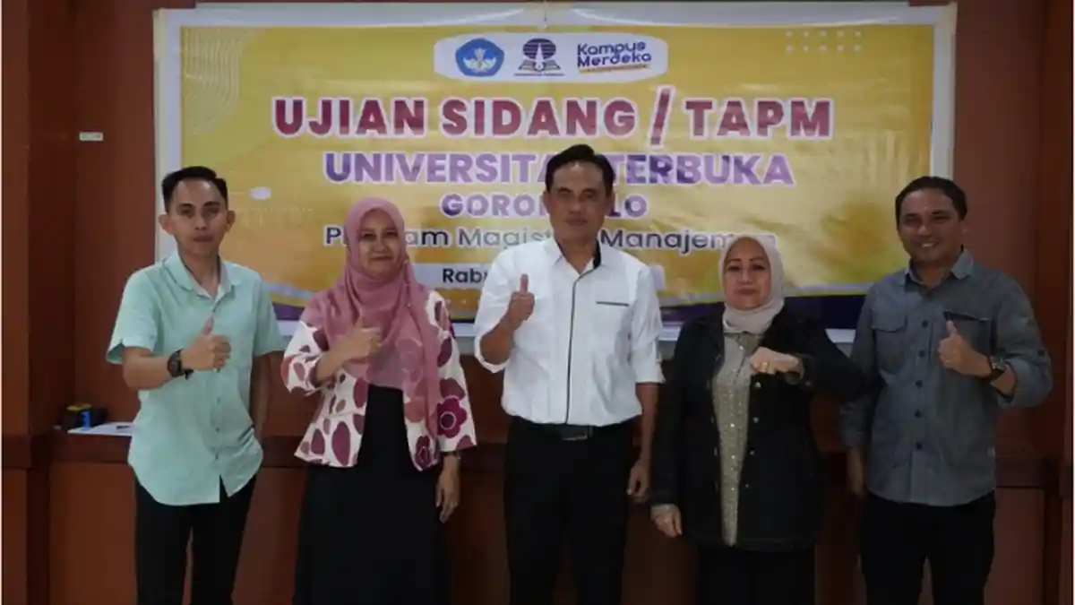 Roni Taningo Raih Gelar Magister manajemen di UT Gorontalo