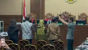Poppy-Dewi-Puspitawati-1.jpg