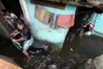 banjir-melanda-kawasan-pagarsih-kota-bandung_20181203_222954.jpg