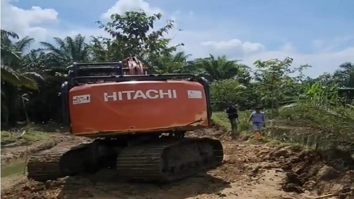 PTPN IV PalmCo Percepat Perbaikan Tanggul Jebol di Padang Tualang