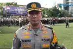 BURU-PENYIRAM-AIR-KERAS-Kabid-Humas-Polda-Metro-Jaya-Kombes-Budi-Hermanto.jpg