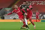 anthony-martial-fabinho-dan-wijnaldum-di-liga-inggris-liverpool-vs-manchester-united-di-anfield.jpg
