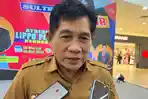 Kepala-Dinas-Transmigrasi-dan-Tenaga-Kerja-Sulawesi-Tenggara-Ali-Haswandy.jpg