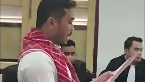 Amsal-Sitepu-duduk-di-kursi-pesakitan-karena-kasus-korupsi-video-melawan-pemdes-kab-karo.jpg