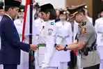 Presiden-Joko-Widodo-Jokowi-secara-simbolis-mengukuhkan-Paskibraka.jpg