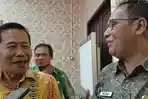 THM-Kiri-Ketua-DPRD-Kota-Serang-Muji-Rohman-dan-Kanan-Kasatpol-PP-Kota-Serang-Heri-Hadi.jpg