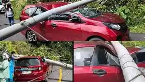kecelakaan-di-Minut-mobil-tertimpa-tiang-listrik.jpg