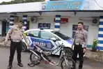 Personel-Satlantas-Polres-Ogan-Ilir-memaparkan-sebuah-sepeda-motor-modifikasi.jpg