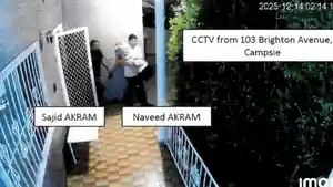Rekaman-CCTV-menunjukkan-Naveed-Akram-dan-ayahnya.jpg