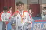 Evan-peraih-medali-emas-cabor-esport-Wardeka-dari-Tim-Manado-A0.jpg