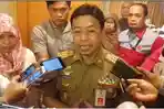 MENINGGAL-DUNIA-Rachmat-Latief-saat-menjabat.jpg