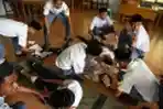 Siswa Lakukan Simulasi Bencana Gempa dan Tsunami