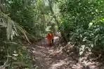 proses-evakuasi-pendaki-gunung-dukono_346.jpg