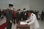 bupati-bolsel-iskandar-kamaru-lantik-dan-mengambil-sumpah-pejabat-fungsional-dan-struktural.jpg
