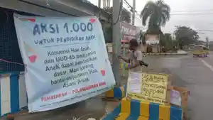 Aksi-solidaritas-1000-untuk-anak-Papua-bela-hak-hak-anak.jpg
