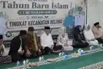 Iskandar-Kamaru-bersama-Ketua-TP-PKK-Hj-Selpian-Kamaru-Manoppo-asdg.jpg