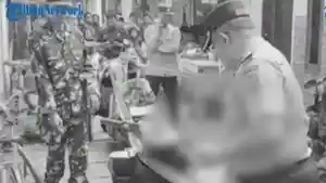 dikeroyok234.jpg