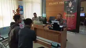 laporan-polisi-cek-Tarman.jpg