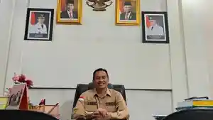 Kepala-Dinas-Pendidikan-Kota-Sawahlunto-Asrild.jpg